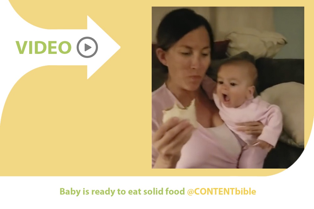 Vídeo de un bebé intentando alcanzar el burrito que come su madre. 